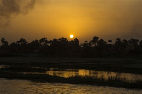 The sunsets off the Nile are unforgettably breathtaking. | Egypt tours, Egypt, Aswan