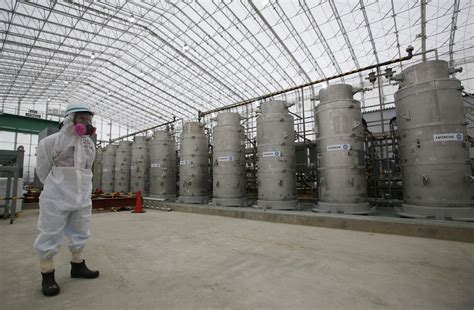 Japan revises Fukushima cleanup plan, delays key steps | AP News