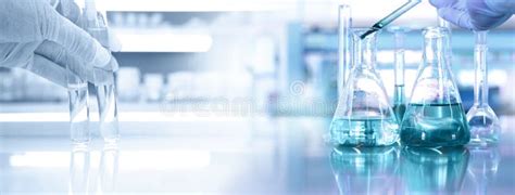 Hand of Scientist with Test Tube and Flask in Medical Chemistry Lab Banner Background Stock ...