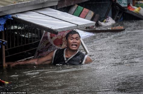 Three killed, tens of thousands evacuated and DOGS swept away as flash ...