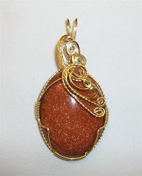 Origins of goldstone, which is not a stone -- or gold. | Jewelry Making Blog | Information ...