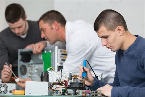 2 Teen Boys and Teacher in Electronics Class Stock Image - Image of knowledge, circuit: 120350537