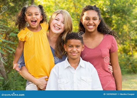 Portrait of a Happy Mixed Race Family Smiling Stock Image - Image of ...