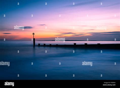 Sunset on Southbourne Beach in Dorset Stock Photo - Alamy