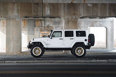 Lifted Jeep Wrangler JK Rolling on Gold Fuel Rims With Colormatched Lips | Lifted jeep wrangler ...