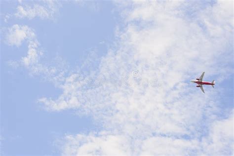 Passenger Plane Flying through the Blue Sky Stock Photo - Image of airbus, showcases: 150688262