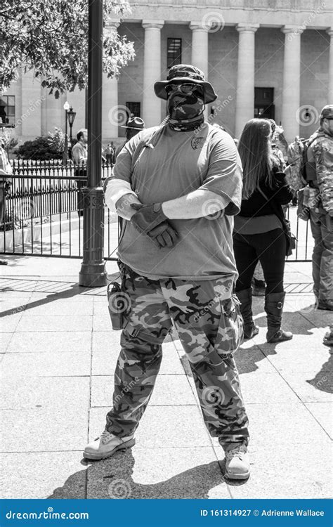 Masked Militia Member Demonstrates in Support of Second Amendment in ...