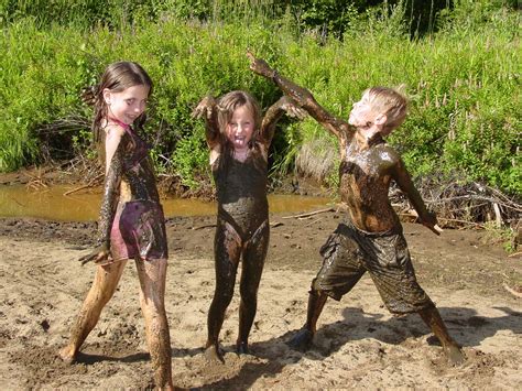 Swimming in the creek. Three mud-soaked cousins decide to have a mud ...