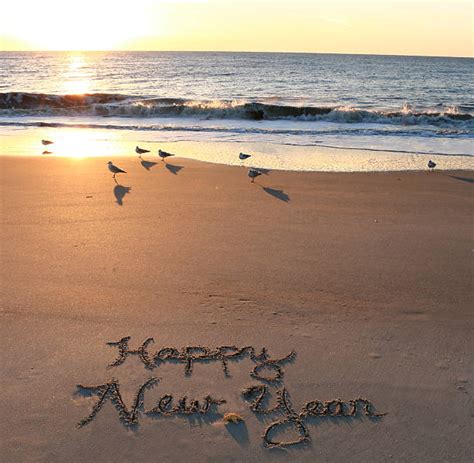 Happy New Year Beach Stock Photos, Pictures & Royalty-Free Images - iStock