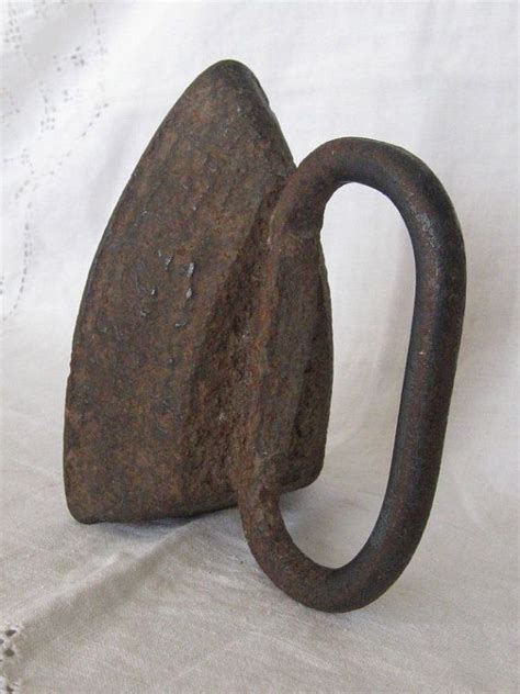 Antique iron in rusty cast iron | Antique iron, Antiques, Vintage iron