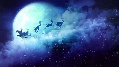 Santa And Reindeer Wallpaper