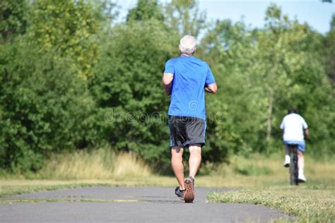 A People Outdoors Exercising Stock Image - Image of fitness, nature: 146561415