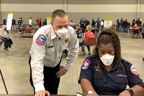 At an Arlington COVID-19 vaccination site, a first responder sees ‘the ...