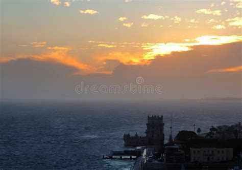 Belem tower at sunset stock photo. Image of europe, cityscape - 119944036