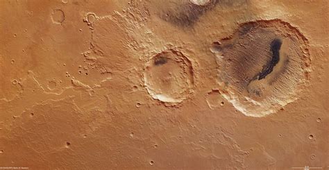 Orbiter.ch Space News: Mars crater shows evidence for climate evolution