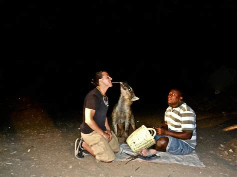 FEEDING A HYENA IN HARAR, ETHIOPIA