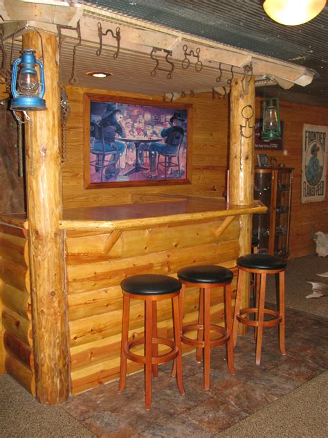 Our downstairs Bar Made out of logs and our woodfloor Minnesota Lake ...