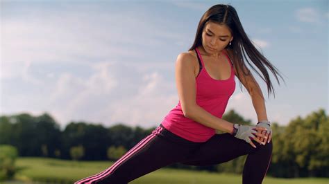 Asian Woman Stretching Legs Outdoor Fitness Stock Footage SBV-312734837 ...