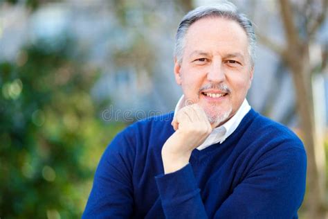 Smiling Mature Man in a Library Stock Image - Image of adult, home ...