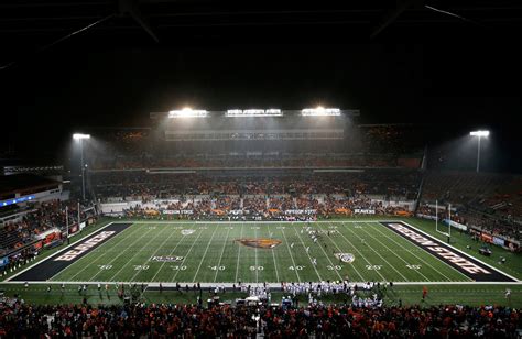 College Football Fan Goes To Bathroom In Middle Of The Stadium - The Spun