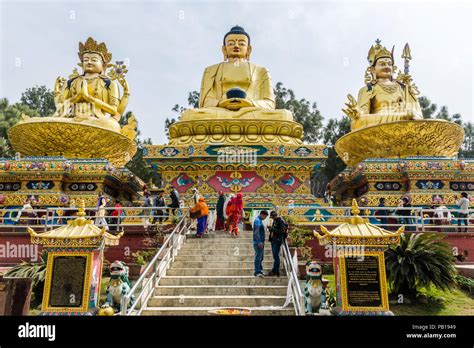 The three golden Buddha statues at Swayambhu Amideva Buddha Park, Kathmandu, Nepal Stock Photo ...