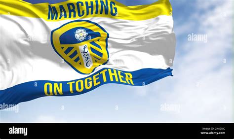 Leeds, UK, Oct. 2022: The Leeds United flag waving in the wind. Leeds United Football Club is an ...