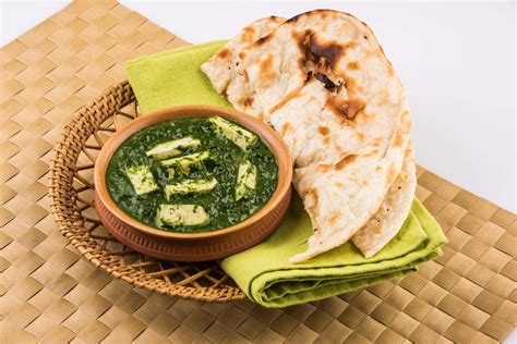 tasty palak paneer served with nan / naan / roti / chapati / fulka ...