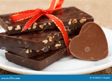 Chocolate Bars with Nuts and Chocolate Candy in Shape of Heart Stock Image - Image of heart ...