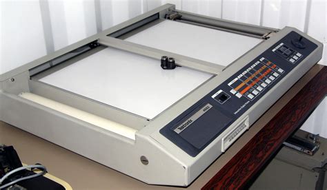 Tektronix made various flatbed plotters. There