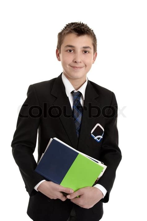 A secondary school student wearing his school uniform holding a bunch ...