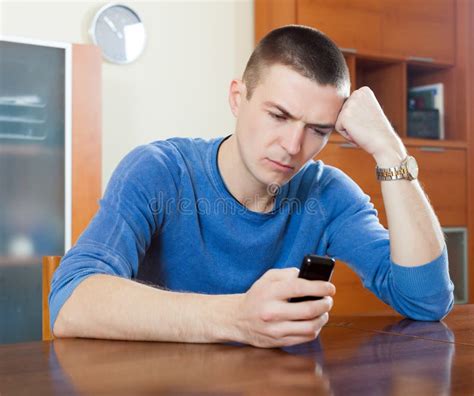 Sad Guy Crying after Phone Call in His Home Stock Photo - Image of ...