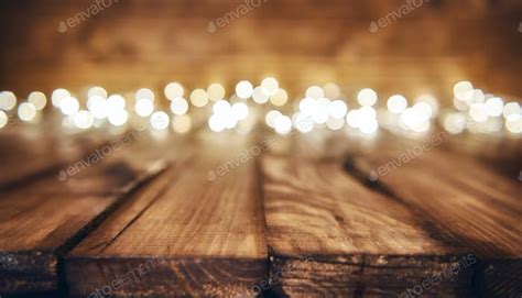 lights on wooden rustic background photo by choreograph on Envato Elements