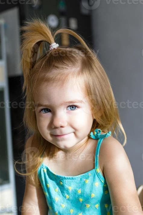 Baby Girl With Blue Eyes And Brown Hair