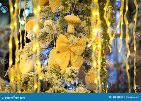 Christmas Tree with Yellow Decor and Lights Stock Image - Image of gift, ball: 102801235