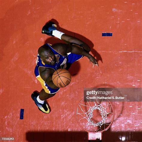 Shaquille Oneal Holding Photos and Premium High Res Pictures - Getty Images