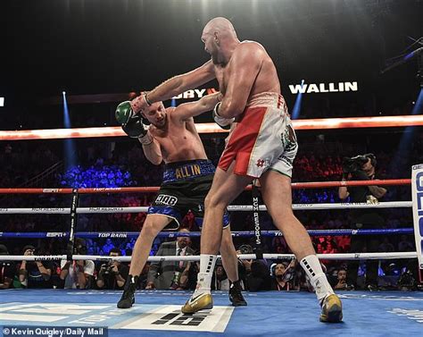 Tyson Fury maintains unbeaten record despite blooded cut above the eye ...