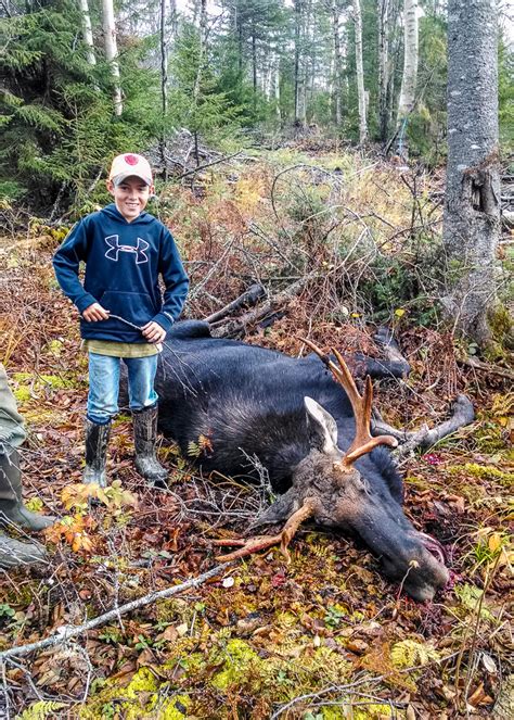 A proud hunter and moose | Johnson's Guide Service