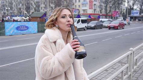 Drunk Woman On Street Drinks Wine From Stock Footage SBV-338109938 - Storyblocks