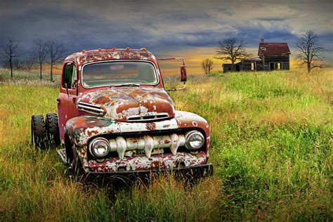 Rusted Vintage Ford Truck in a Grassy Field by an Abandoned Farm ...