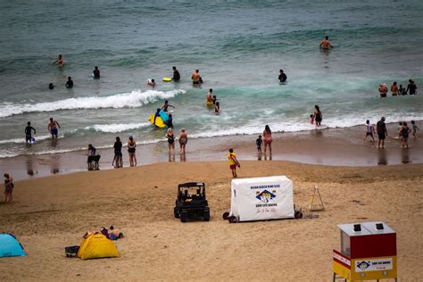 Three rescued as thousands descend on Hawke's Bay beaches - NZ Herald