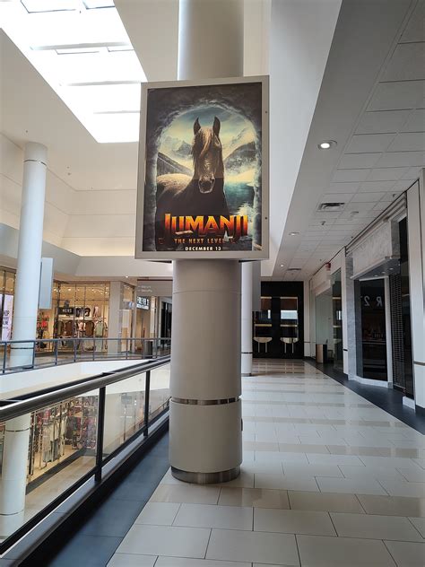 Monmouth Mall (Eatontown, NJ) ad space with a movie from Dec 2019 in a dead section of the mall ...