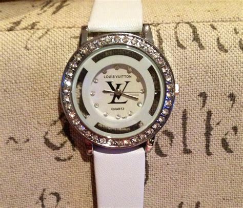 Face book page; A Splash Of Fabulous. Louis Vuitton watch $50.00 ...