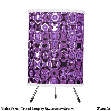 The Violet Vortex Tripod Lamp designed by Artist C.L. Brown features an abstract kinetic light ...