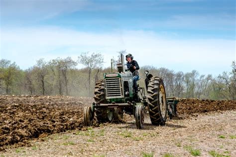 An Old Tractor in a Plowing Event Editorial Stock Image - Image of agriculture, farmers: 94588329