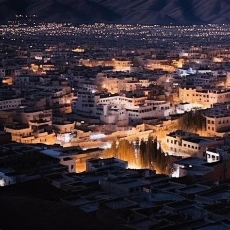 Premium AI Image | aerial night view with moon of leh city from leh ...