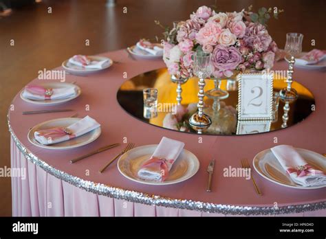 Table appointments in restaurant. Pink wedding preparation Stock Photo ...