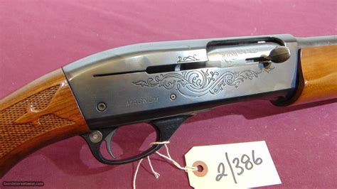 REMINGTON 1100 SEMI AUTO 12 GA MAGNUM SHOTGUN 3"