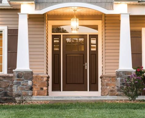 Chestnut-colored entry door on a beige house | Front door colors, Exterior door colors, Door color