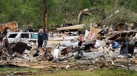 At least 34 dead, half a million without power after storms batter ...