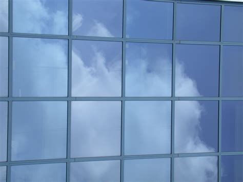 glass windows building clouds sky | Clouds, Glass window, Sky